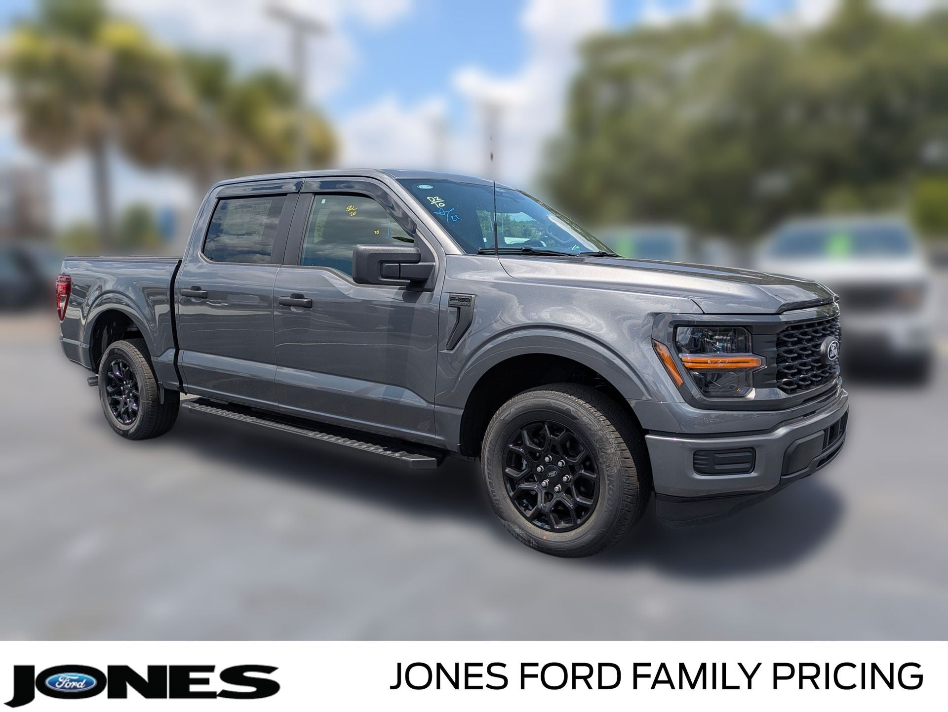 2026 Ford F-150 STX in Carbonized Gray Metallic — front three-quarter view