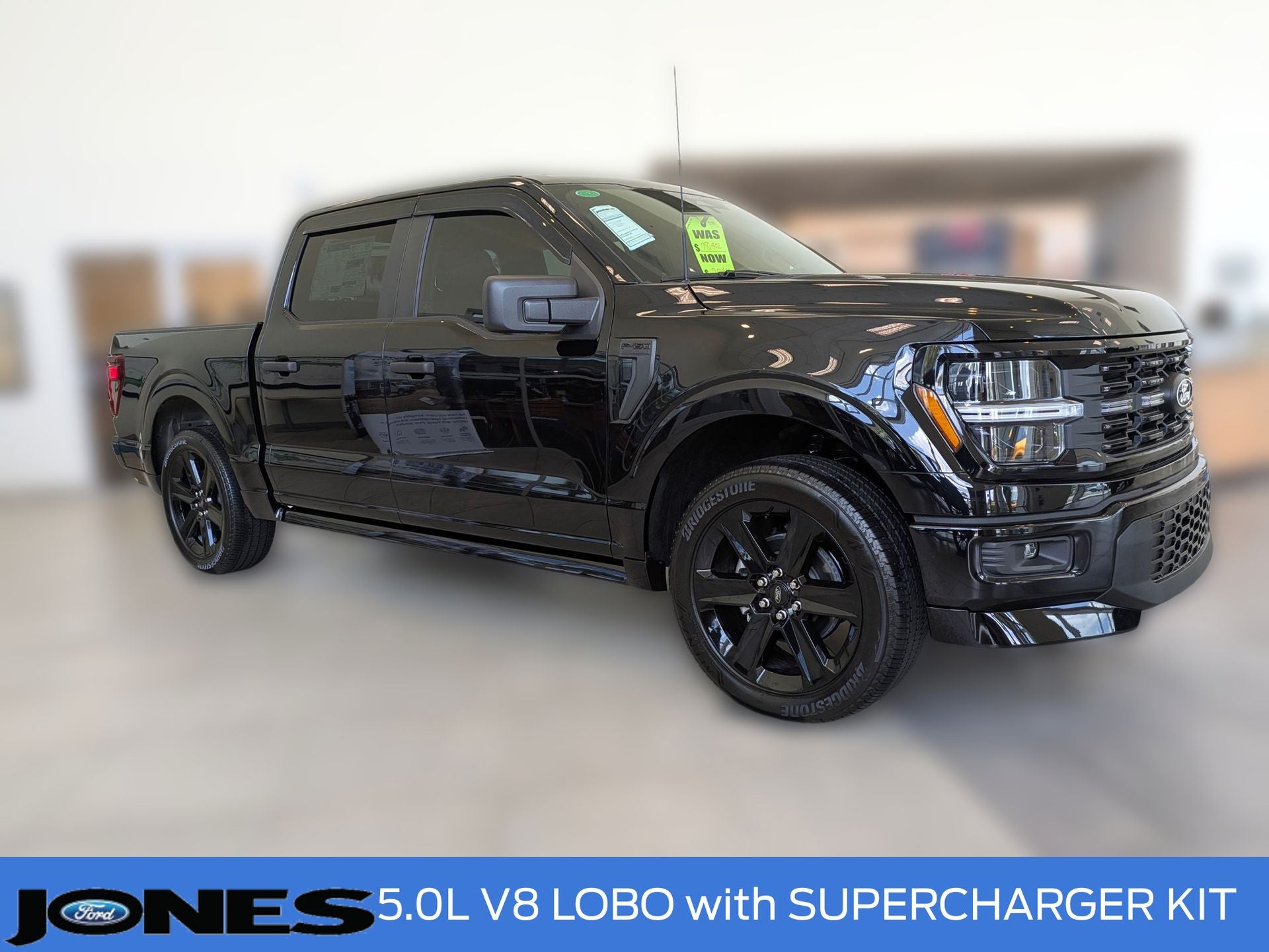 2026 Ford F-150 STX in Agate Black Metallic — front three-quarter view