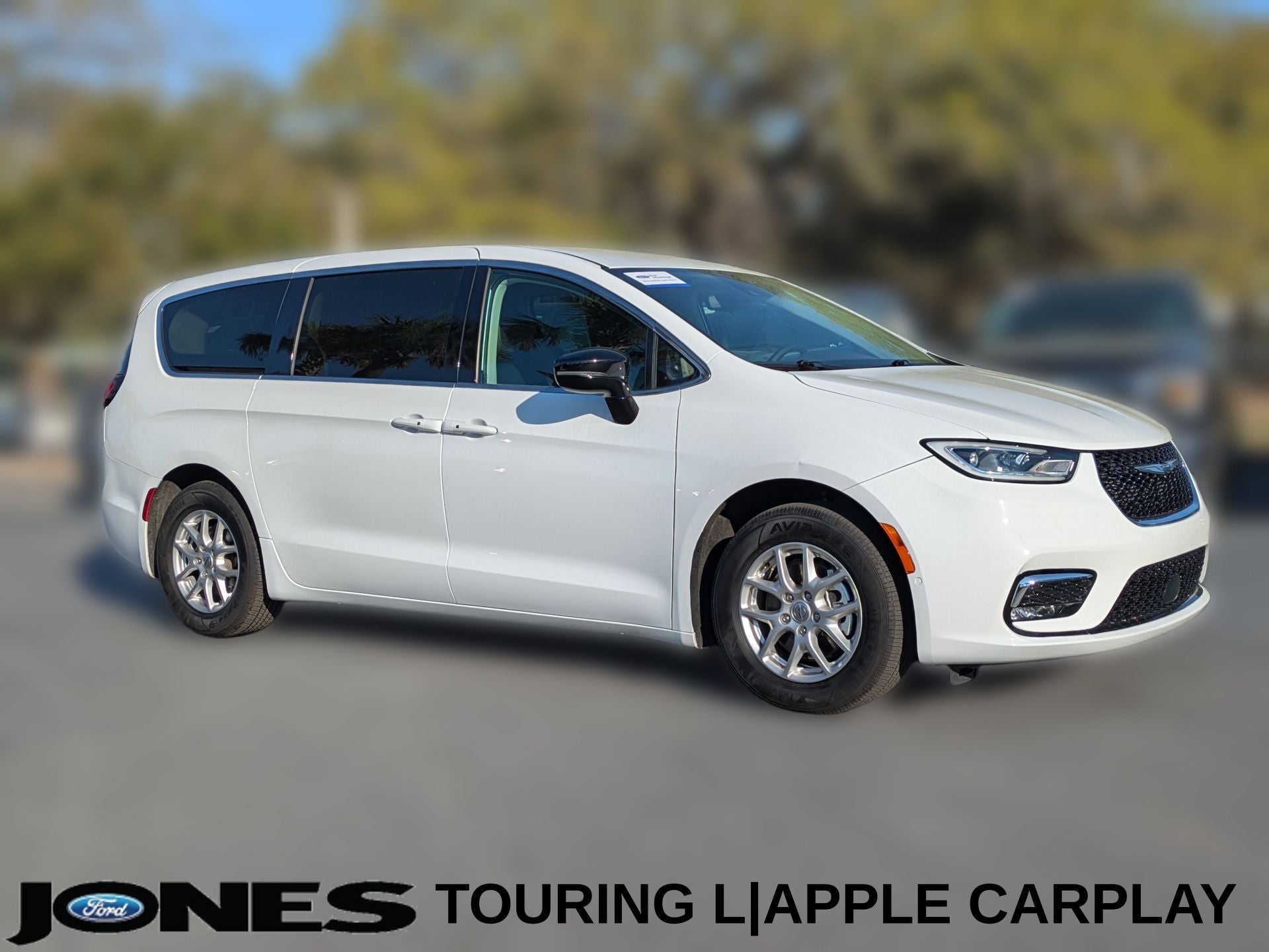 2024 Chrysler Pacifica Touring L in Bright White Clearcoat — front three-quarter view