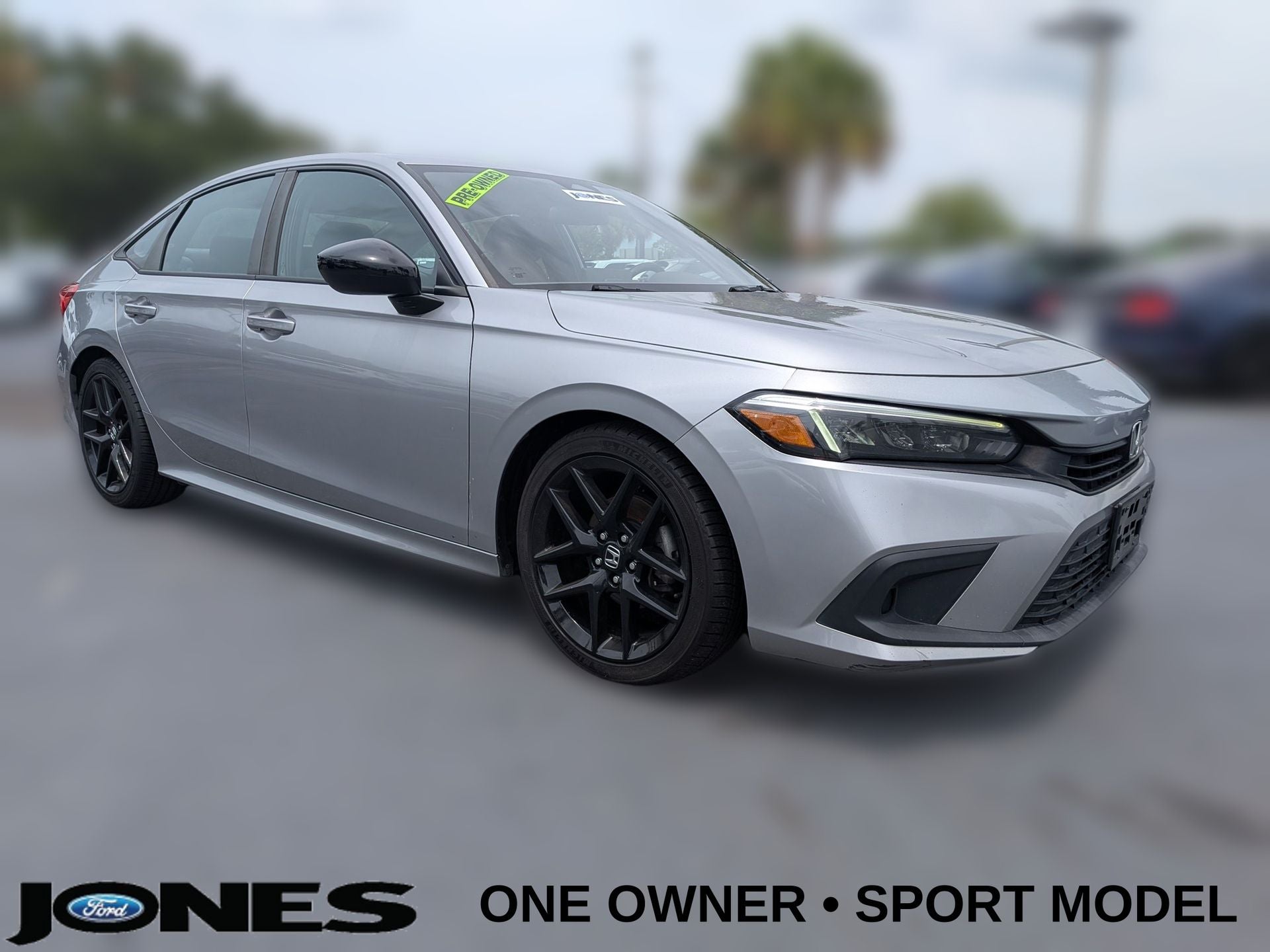 2023 Honda Civic Sport in Silver — front three-quarter view