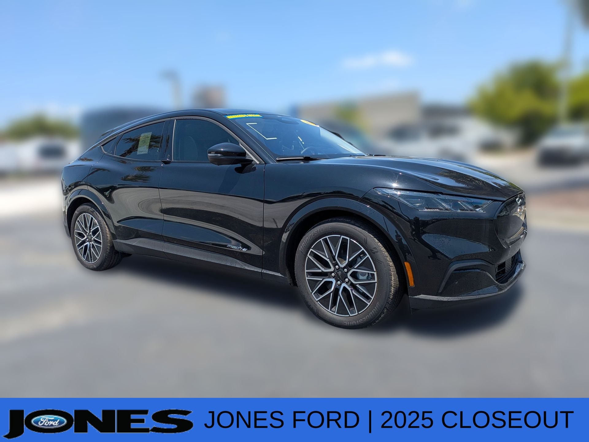 2025 Ford Mustang Mach-E Premium in Shadow Black — front three-quarter view