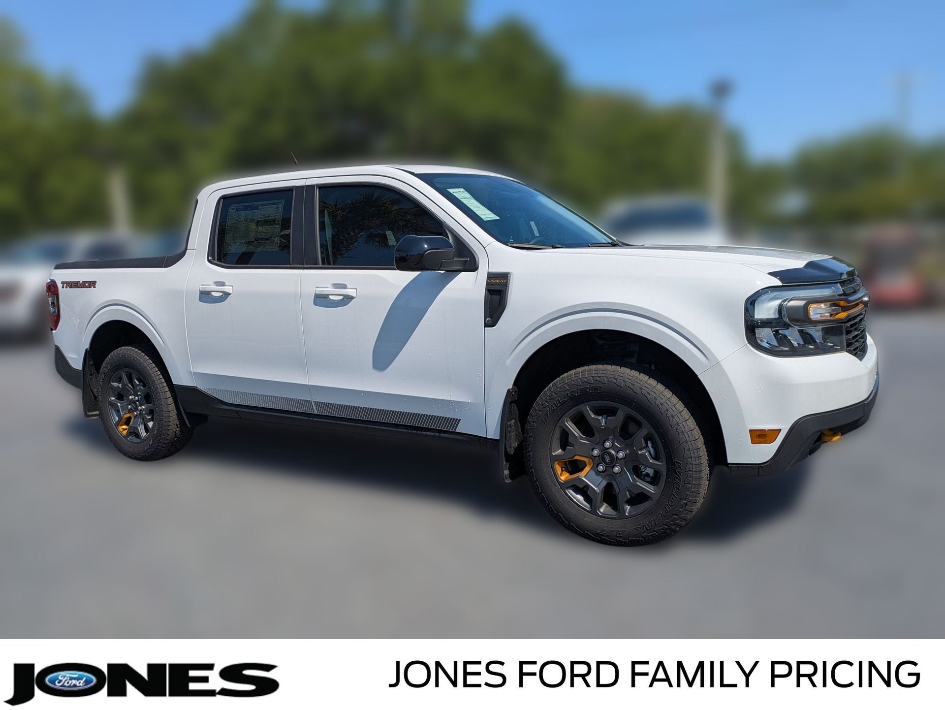 2024 Ford Maverick Lariat in Oxford White — front three-quarter view